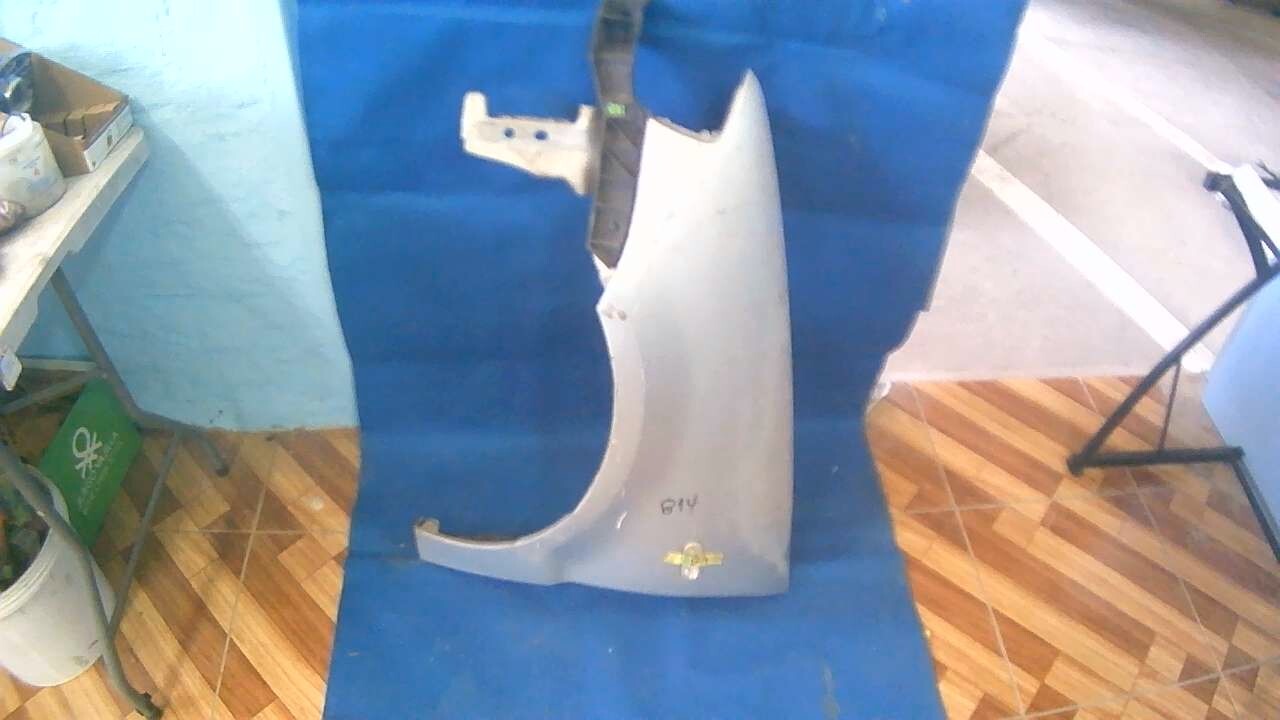 TAPABARRO IZQUIERDO CON FOCO INTERMITENTE Y MENSULA Volkswagen Polo 2002