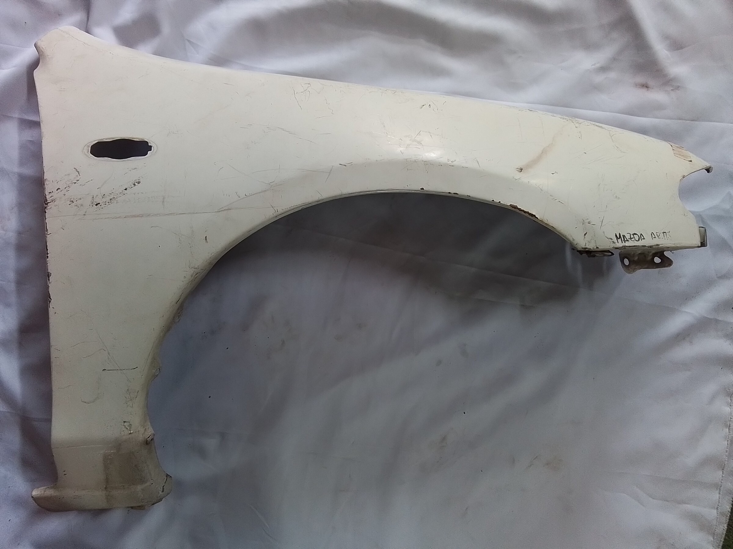 TAPABARRO DERECHO DELANTERO M Mazda ARTIS 1997